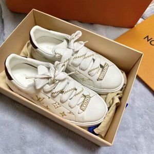 Never worn new Louis Vuitton Women  sneakers.